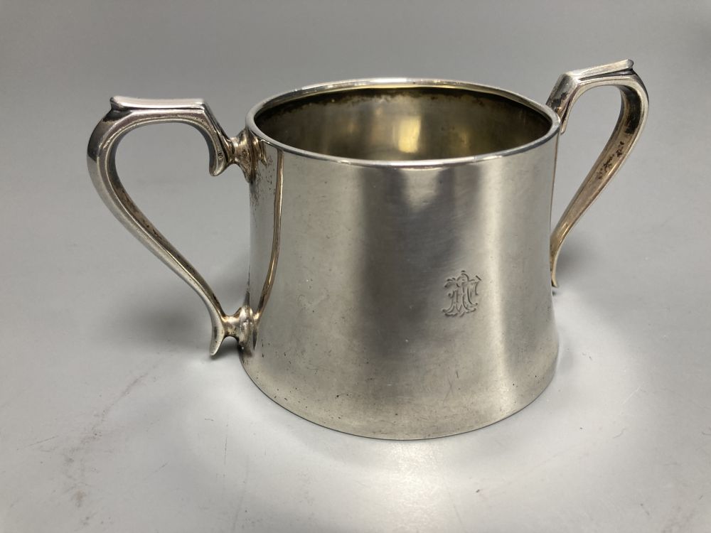 A George V Brittania standard silver sparrow beak cream jug, London, 1910 and an earlier silver two handled sugar bowl,